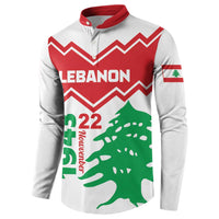White button sweatshirt with red collar, Lebanon chevron design, green tree and flag sleeve