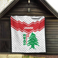 Quilt with red chevron stripe and Lebanon text, featuring green cedar tree and 22