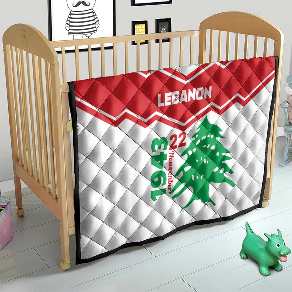 Red-and-white chevron quilt for baby crib with Lebanon text, green cedar tree and 22