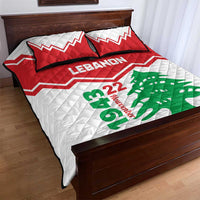 Quilt bed set with white quilt, red Chevron border, green cedar graphic and Lebanon text