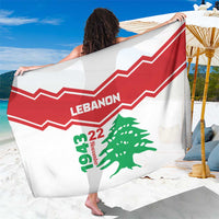 White Lebanon sarong with red chevrons and green cedar graphic