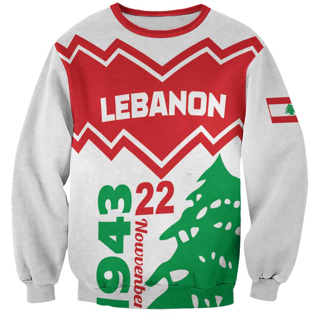 Gray sweatshirt with red chevron graphic, green cedar tree, 'LEBANON' and '22' print
