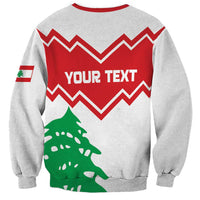 Gray sweatshirt back with red zigzag, 'YOUR TEXT' and green cedar tree graphic