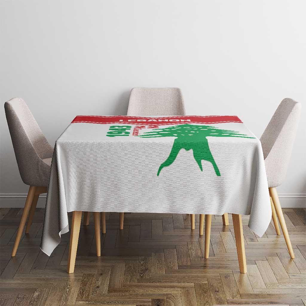 Lebanon Independence Day tablecloth on dining set with red border and green cedar print