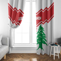 White window curtain with red chevron stripes and green cedar tree motif