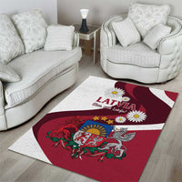 Red and white Latvia area rug with crest, striped border, and daisy flowers