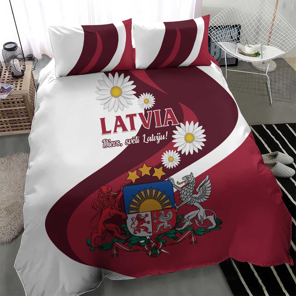 Red and white Latvia duvet cover with flag stripes, crest, and daisy print, with pillows