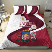 Red and white Latvia bedding set on bed with duvet cover flag stripes, crest, and daisies