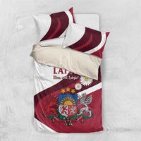 Red and white Latvia bedding set flat lay with duvet cover, flag stripes, crest, and pillows