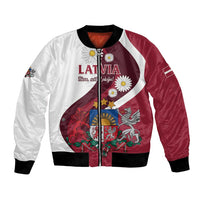 Red and white satin bomber jacket with black ribbed cuffs, Latvia text, crest, and daisies