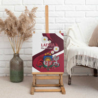 Latvia canvas wall art on easel with maroon crest, daisies, and "LATVIJA" text