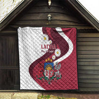 Latvia flag quilt red and white hanging on wooden barn door with diamond stitching