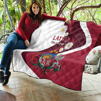 Latvia flag quilt red and white laid on outdoor bench with diamond stitching