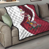Latvia flag quilt red and white on gray sofa with diamond stitching and crest graphic