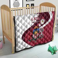 Latvia flag quilt red and white draped over wooden crib with diamond stitching