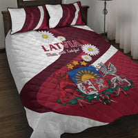 Red and white Latvia quilt bed set with crest, daisies, and two matching striped pillows
