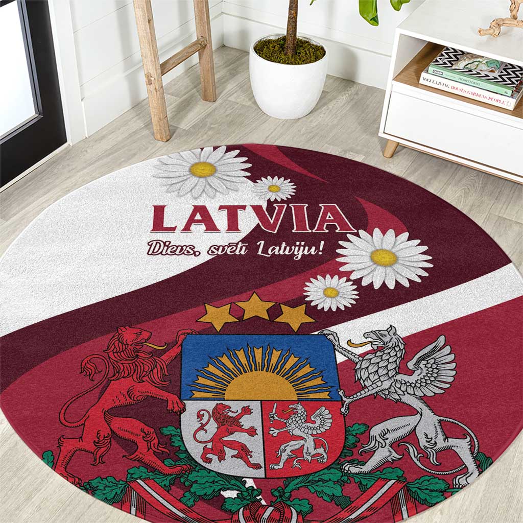 Red round area rug with Latvia text and daisy flowers, crest and lion graphics