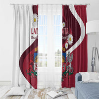 Red and white Latvian flag curtains with daisies, crest, and white curved stripe.