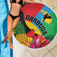 Round beach blanket with fringed edge, colorful tropical bird print and Barbuda text