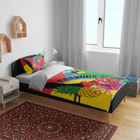 Tropical duvet bedding set on bed with two pillows showing toucans, pineapple, hibiscus, BARBUDA