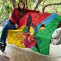 Colorful tropical quilt with bird graphic, pineapple and blooms on diamond-quilted fabric.