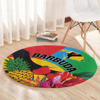 Round tropical area rug with Barbuda text and vibrant tropical flower and bird print