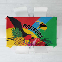 Colorful tropical tablecloth with frigate birds, flowers, and green border edge