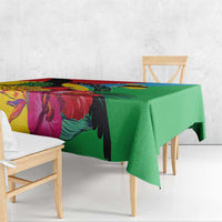 Tropical tablecloth with green base and vibrant bird-and-flower print