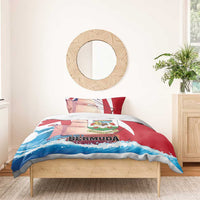 Bermuda bedding set with red crest and BERMUDA text, flag accents, blue wave pattern
