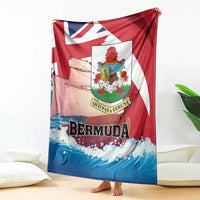 Red, white, and blue Bermuda-themed blanket with crest and “BERMUDA” text, spread out