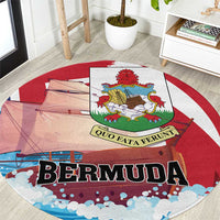 Red round rug with Bermuda crest graphic, QUO FATA FERUNT text, blue wave border
