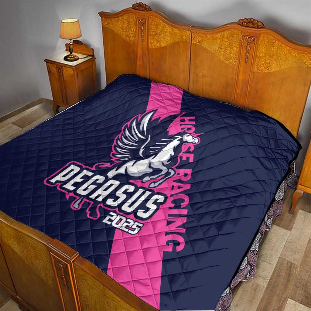 Navy quilt with Pegasus 2025 graphic and pink diagonal stripe, diamond stitching.
