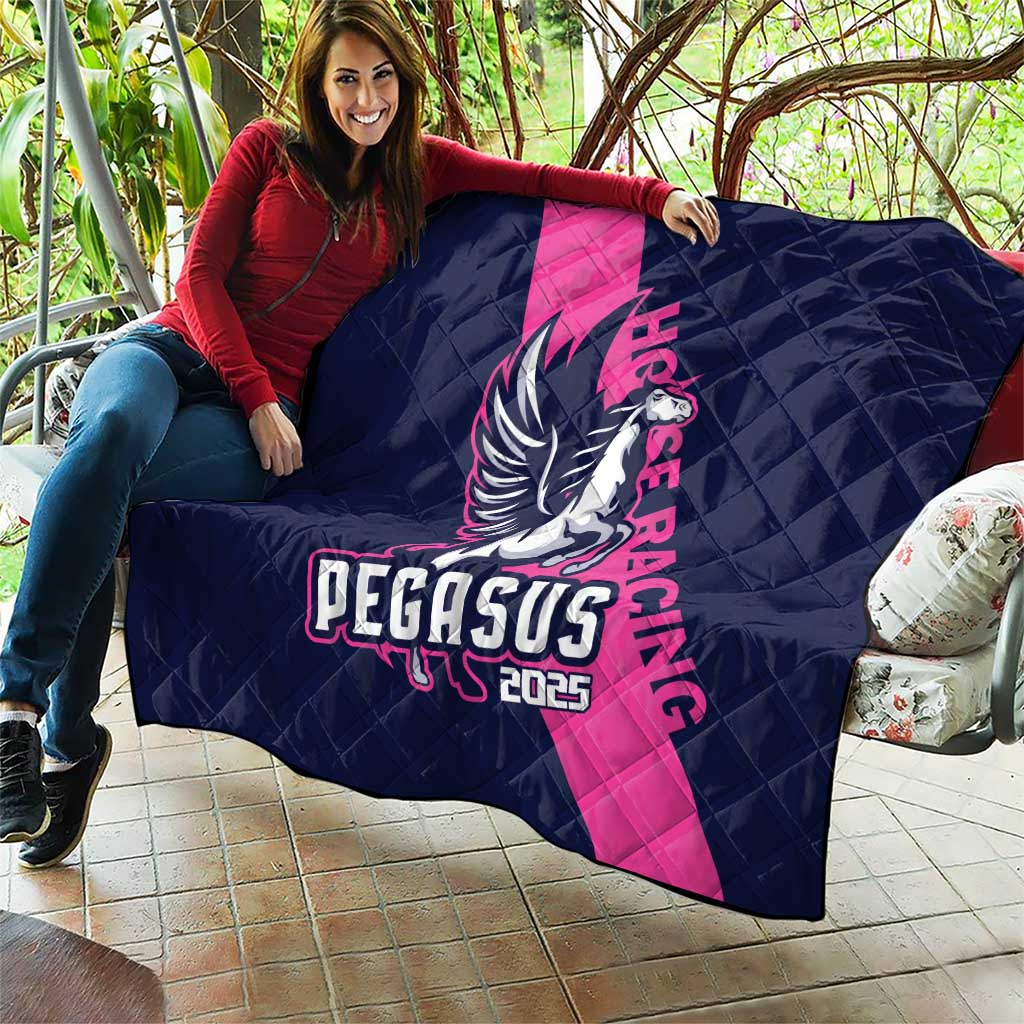 Navy and pink quilt blanket with Pegasus 2025 emblem, quilted diamond weave.