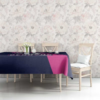Navy and pink Pegasus horse racing tablecloth on dining table with chairs