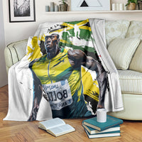 Jamaica blanket with white base and green/yellow Jamaica athlete graphic