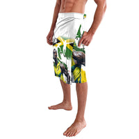 Men's graphic swim shorts with white waistband and green yellow black artwork