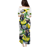 Women's long dress with white base and green/yellow graphic print, short sleeves, back view