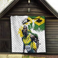 White quilt with Jamaica flag print and runner silhouettes, diamond-quilted fabric.