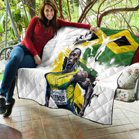 White quilt with Jamaica flag and portrait, diamond quilting with green-yellow graphics.