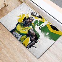 Rectangular rubber doormat with Jamaica flag splash design and athlete photo in yellow