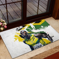 Rectangular rubber doormat with athlete photo and green-yellow flag colors on white