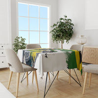 Rectangular white tablecloth featuring green yellow black bold action graphic