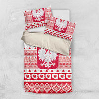 Polish Christmas bedding set flat lay with red-and-white eagle emblem and geometric patterns