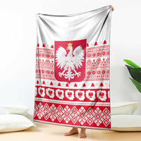 Red-and-white Christmas throw blanket with central Polish eagle and patterned border