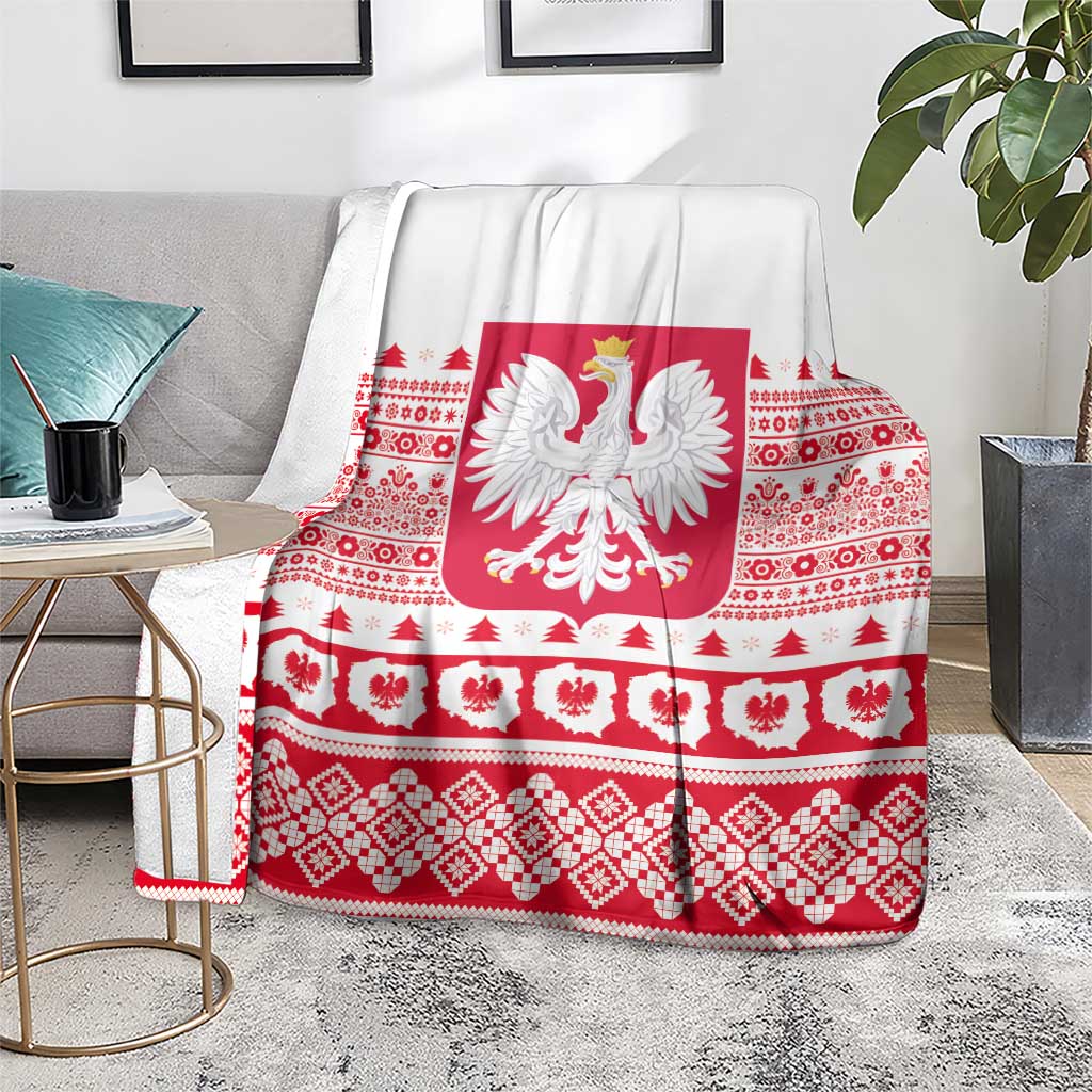 Polish Christmas blanket with red folk designs and central eagle emblem on white