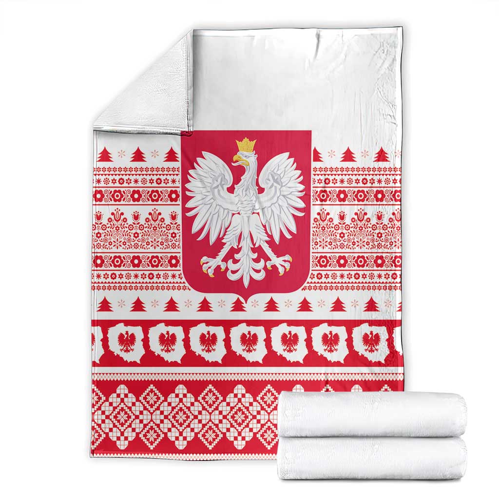 Folded Christmas blanket featuring Polish eagle emblem, red-and-white folk pattern bands