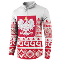 White quarter-zip sweatshirt with large red Polish eagle panel and holiday motifs