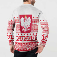 White sweatshirt back on model, red eagle crest over fair isle and tree motifs