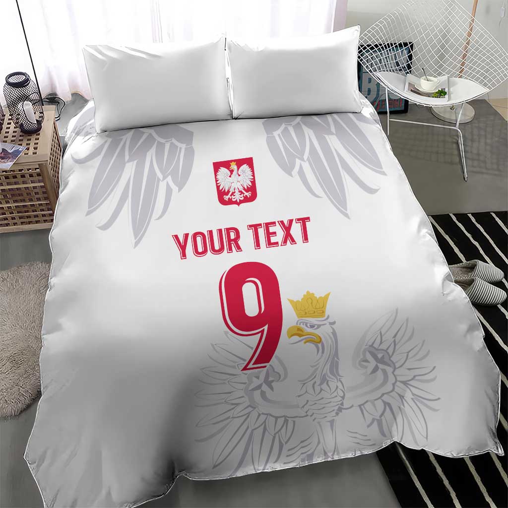 White duvet and two pillows with Polish crest, eagle graphic, red 9 and custom text.