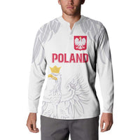 White long-sleeve button sweatshirt on model front with POLAND text and eagle graphic